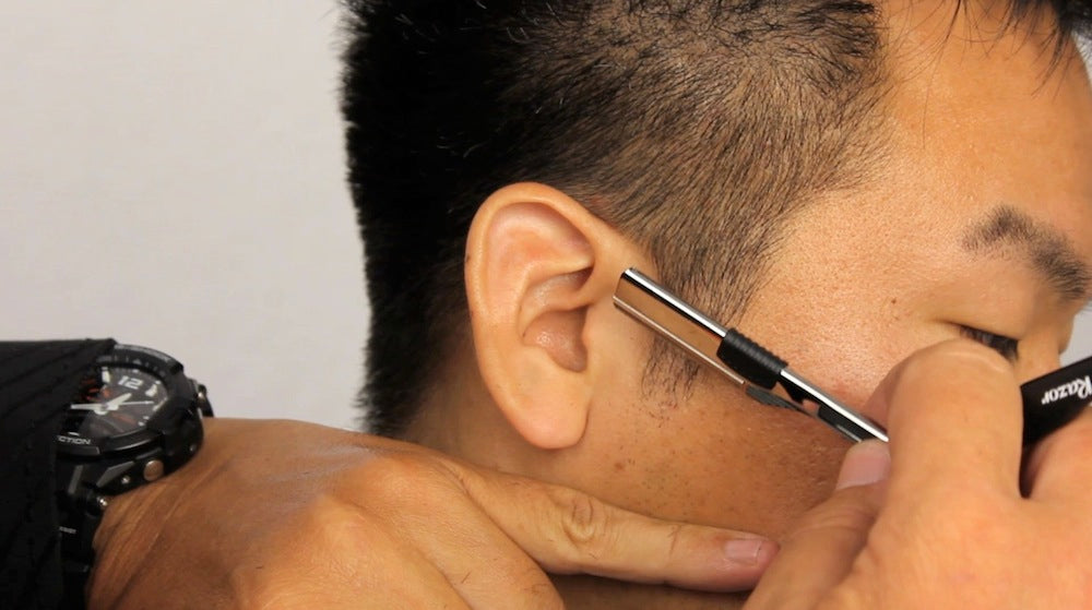 Men's Razor Haircut - Using a Feather Nape Razor Part 5