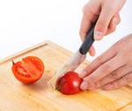 Seki Edge Butter Peeler and Knife SJ-K380 - cutting tomatoes